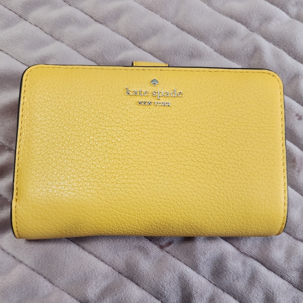kate spade yellow pebbled leather zip-around wallet